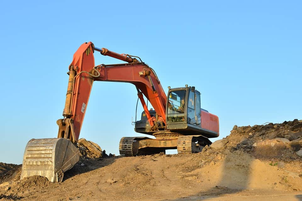 A construction worker uses equipment to demolish concrete during a site excavation near Nicholasville, Kentucky (KY)
